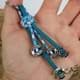 Bild von Paracord 550 Zipper Glücksanhänger 4 Hufeisen Schlüsselanhänger blue shock / ozean türkis